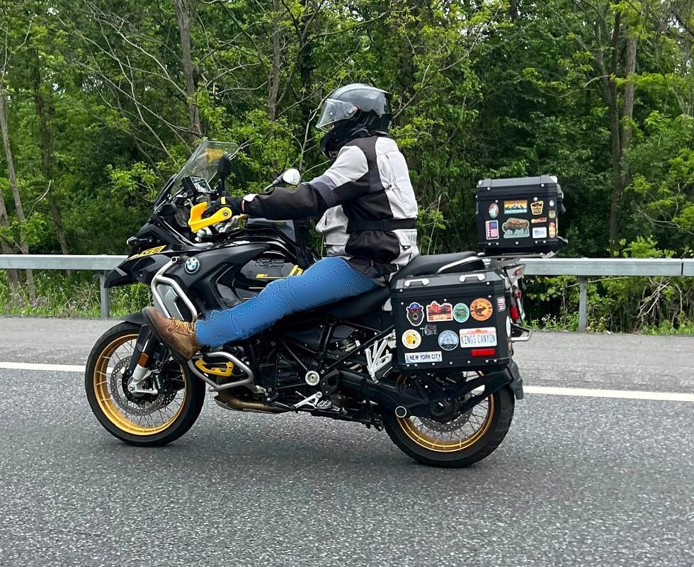 Yellow and black R1250 GSA with rider using Calf Rests